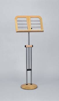 Bild: Notenständer Holz und EdelstahlHolz und Edelstahl
Edle Hölzer mit&nbsp; Edelstahl im aktuellen ArchitekturtrendHöhe: 75 cm bis 130 cmAblage: 30 cm hoch und 48 cm breit.Es werden 2 Magnetknöpfe, natürlich in gleicher Holzart, mitgeliefert, welche rechts und links der Ablage den Notenblättern zusätzlichen Halt geben.