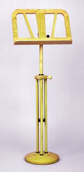 Bild: Notenständer SinfonieModisch aktuell durch eine dekorative Dreiersäule
&nbsp;&nbsp;Höhe: 75 cm bis 130 cmAblage: 30 cm hoch und 48 cm breit.&nbsp;Es werden 2 Magnetknöpfe, natürlich in gleicher Holzart, mitgeliefert, welche rechts und links der Ablage den Notenblättern zusätzlichen Halt geben.